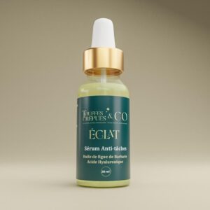 Image d'un sérum anti-tache de la gamme Éclat, enrichi en huile de figue de barbarie et acide hyaluronique, conçu pour atténuer les taches et hydrater la peau.
