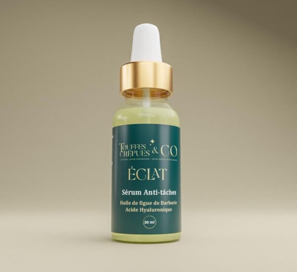 Image d'un sérum anti-tache de la gamme Éclat, enrichi en huile de figue de barbarie et acide hyaluronique, conçu pour atténuer les taches et hydrater la peau.